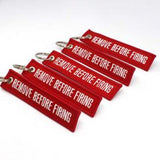 Remove Before Firing Keychain - Red/White